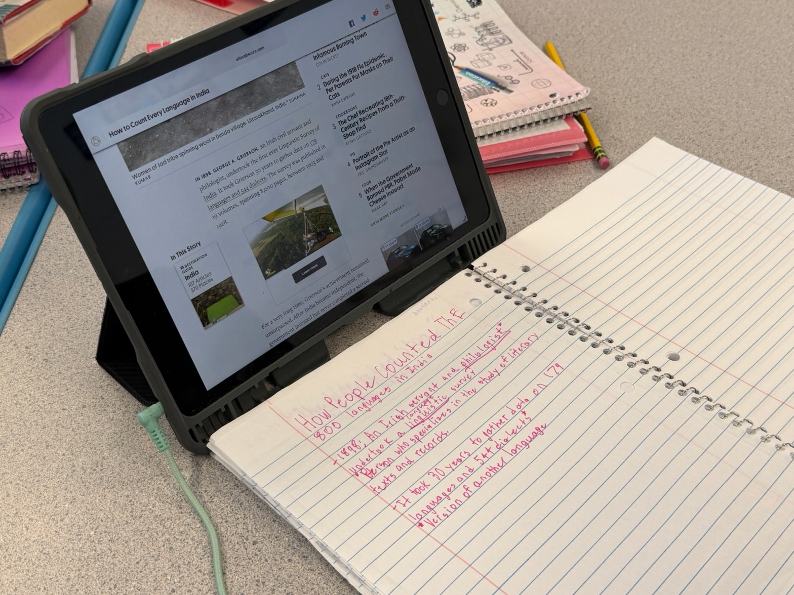 photo of a book with an ipad near it