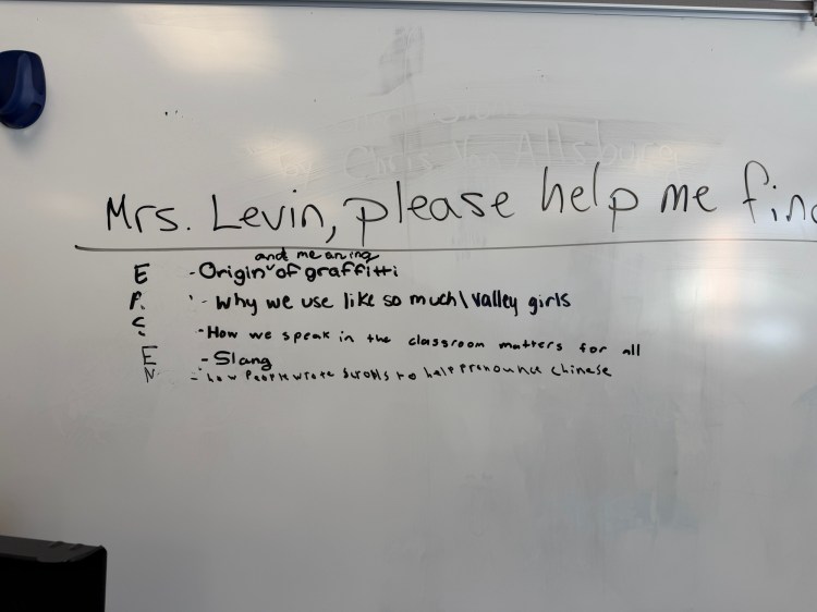 photo of a request list on a white board